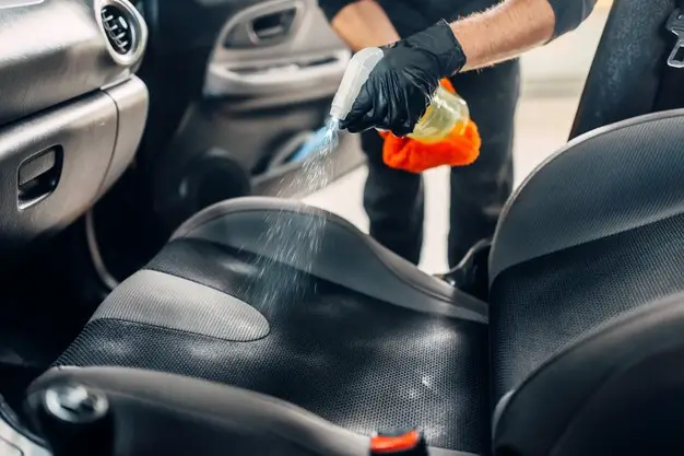 Professional chemical cleaning of car seats textile.